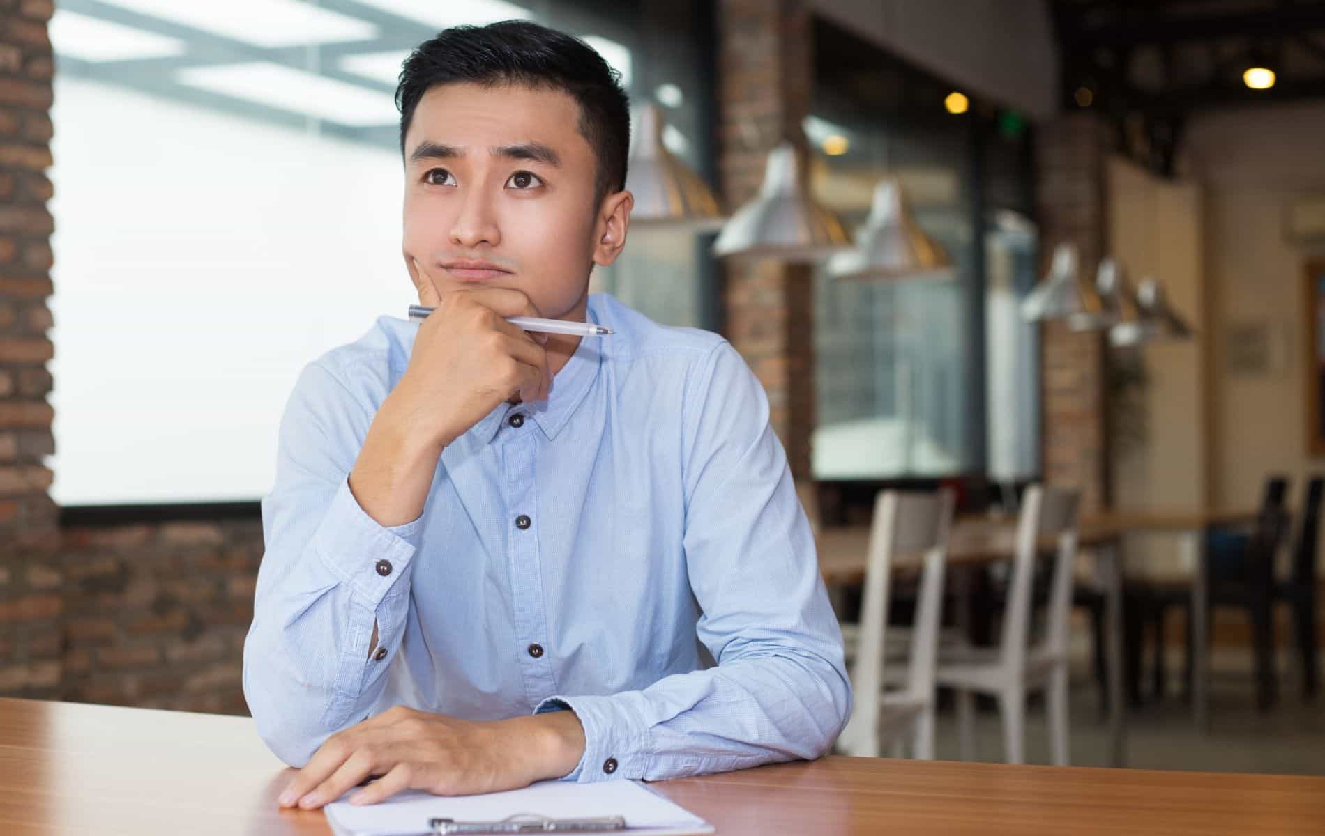 man thinking of sore throat